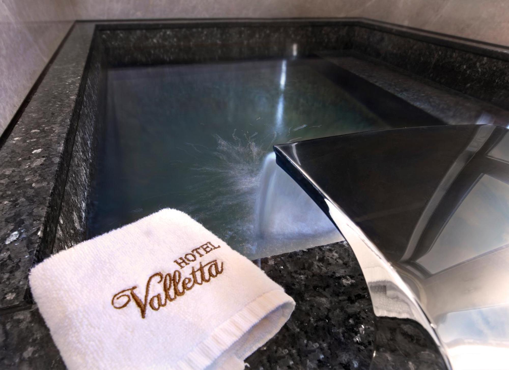 Hotel Valletta Цзяоси Экстерьер фото